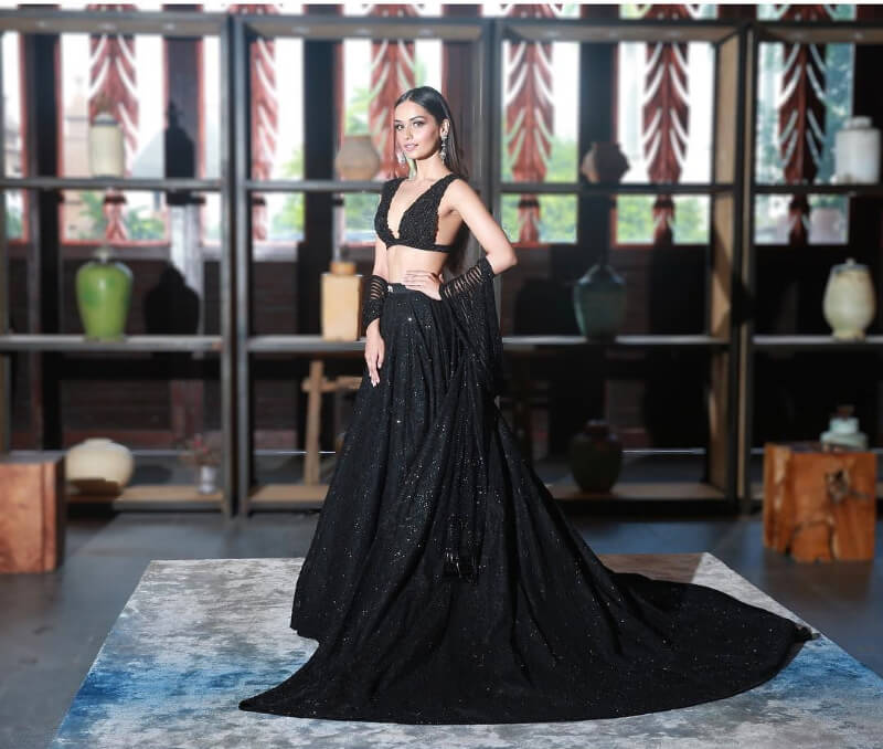 Manushi Chillar in black lehenga with backless blouse and matching sequined dupatta