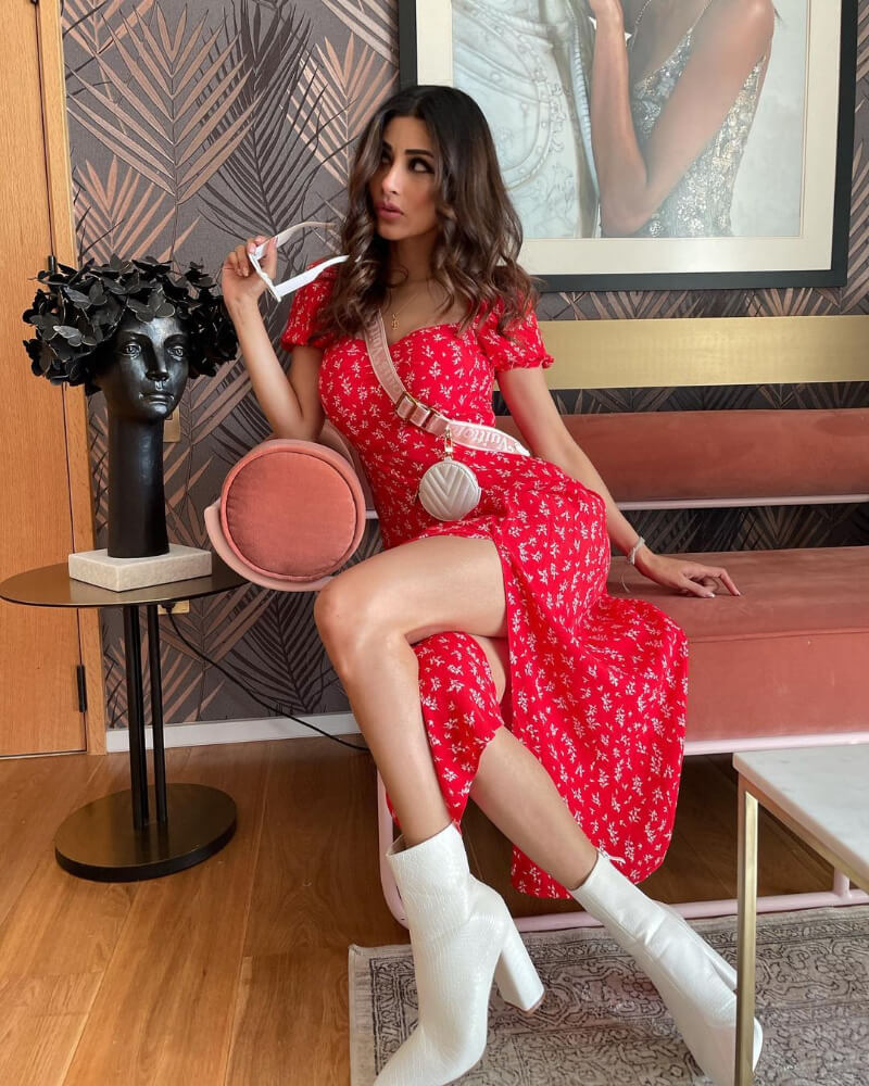 Mouni Roy shares an amazing picture from Dubai in a printed floral red dress with a slit