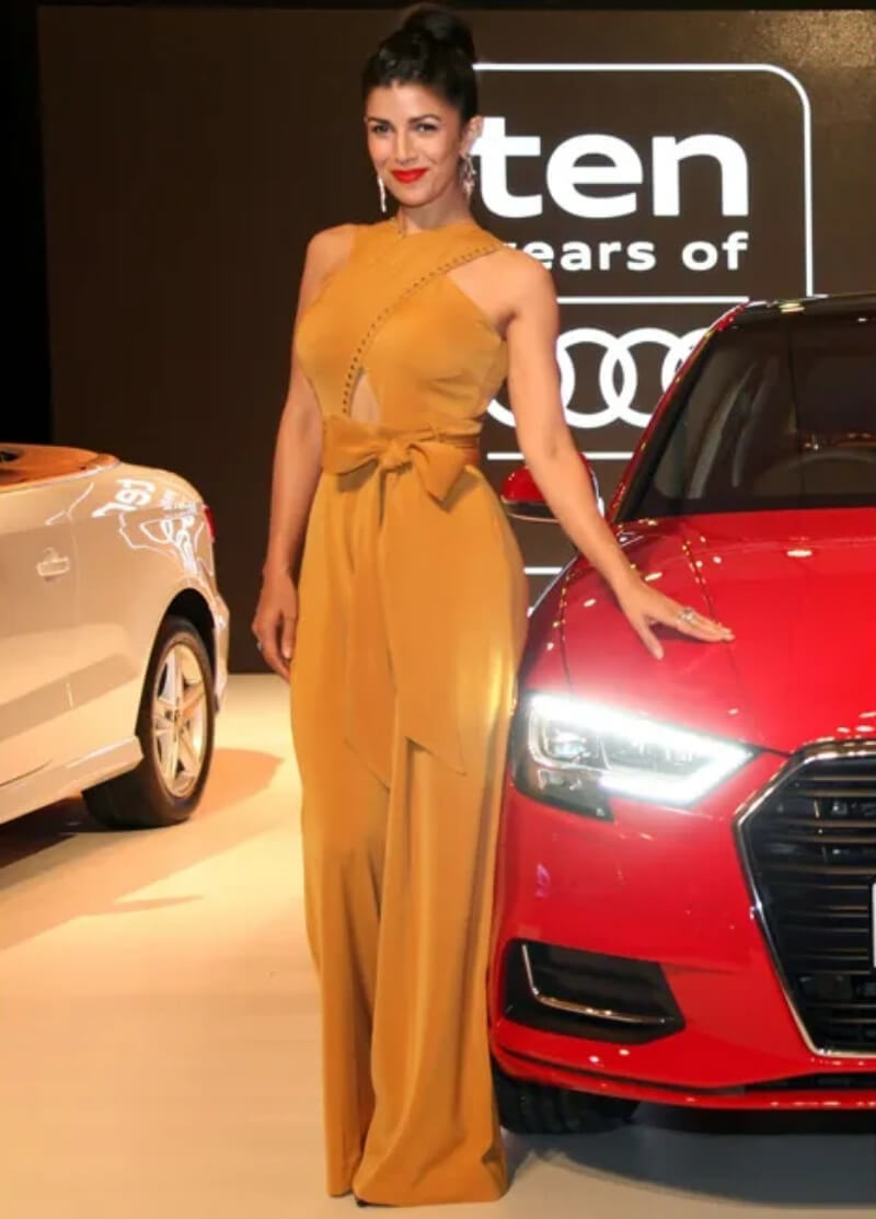 Nimrit Kaur at the launch of ‘Audi A3 Cabriolet In mustard Colored wide leg jumpsuit