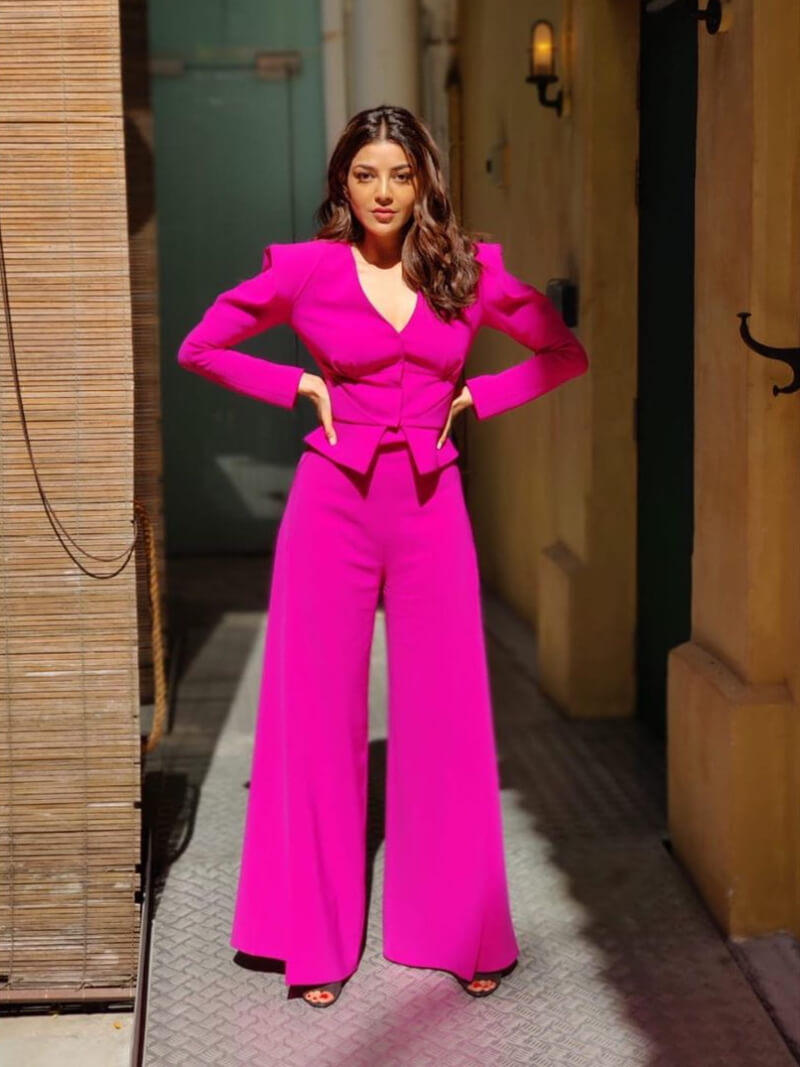 Special 26 actress Kajal Aggarwal in pink wide-legged pants with matching top