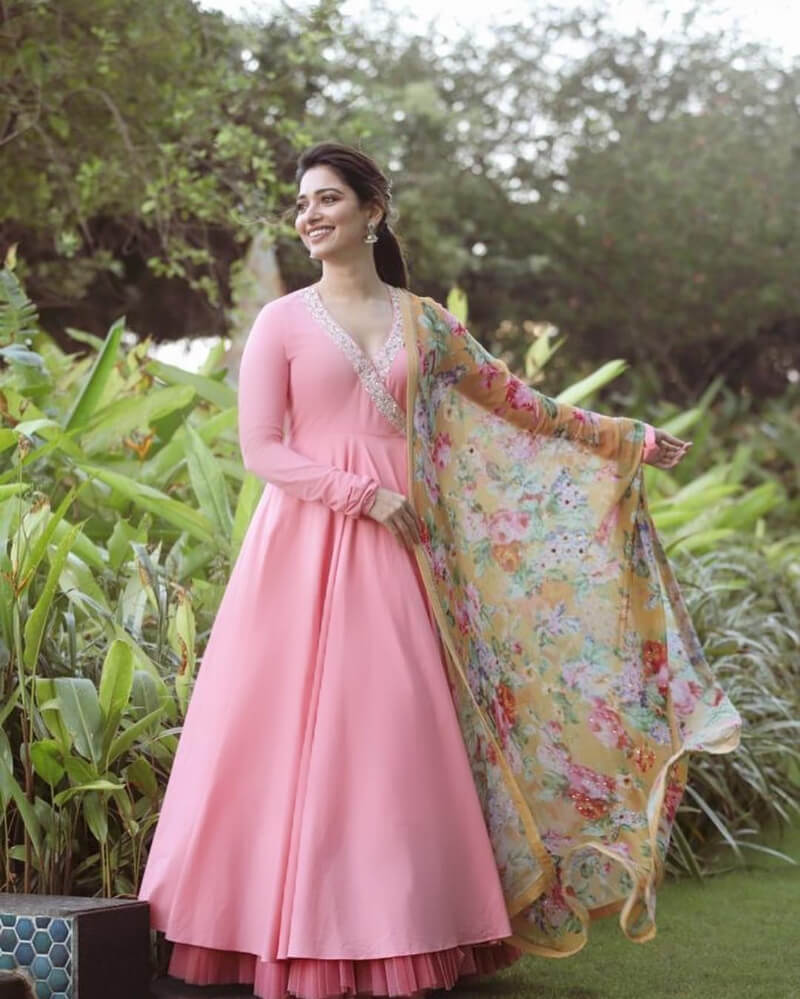 Tamannaah in plain pink anarkali suit with yellow floral dupatta for Kanne Kalaimaane  promotions