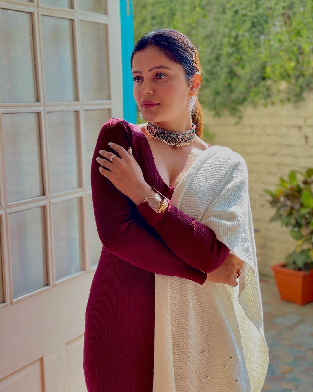 Actress Rubina Dilaik  In The Figure-Hugging Burgundy Knitwear Dress 