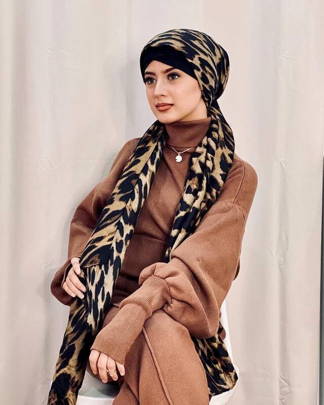 Arishfa In A Brown Dress And Black Hijab