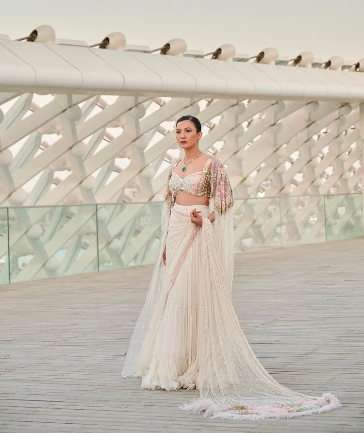 At IIFA Gauahar Khan in a white saree with a golden printed blouse