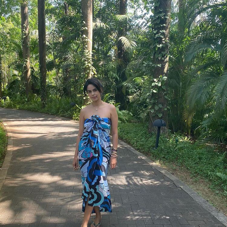 Bollywood Actress Mallika Sherawat in a blue Beach Cover-up or Wrap dress