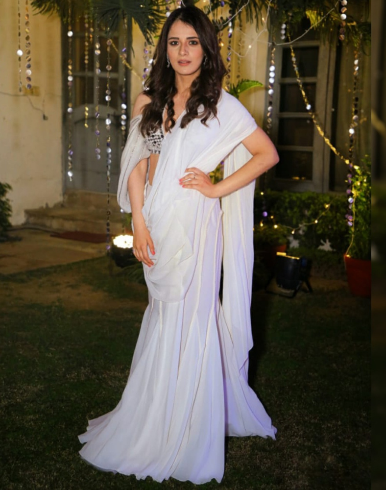 Film Actress Radhika Madan In A White Fluid Saree With A Crystal-Embellished Bodice