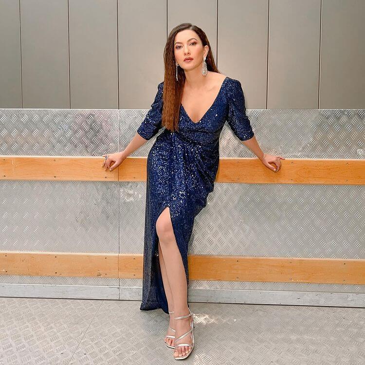 Gauahar Khan promoting her song Khair Kare in a slinky sequin blue dress