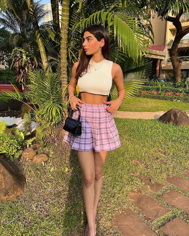 Instagram Diva Khushi Kapoor In off a white crop top and check skirt