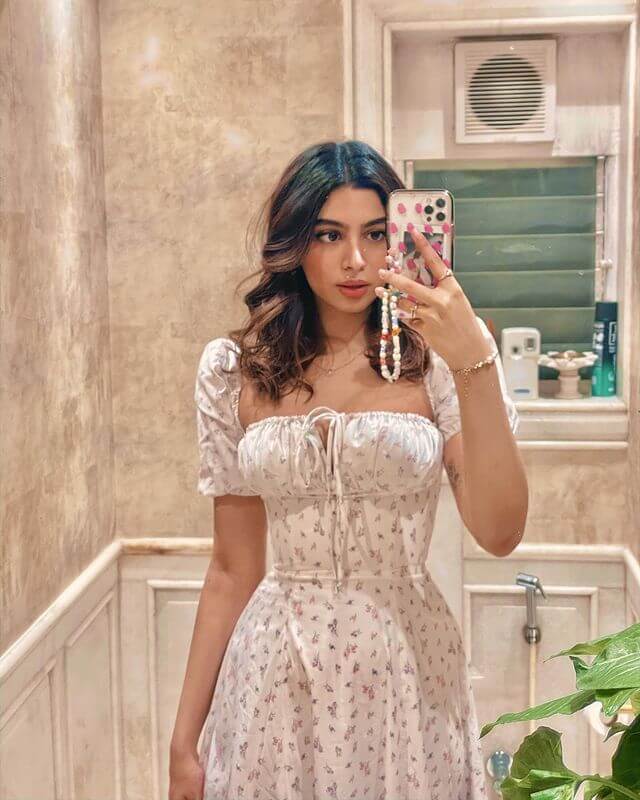 Khushi Kapoor takes a bathroom selfie in a printed white dress