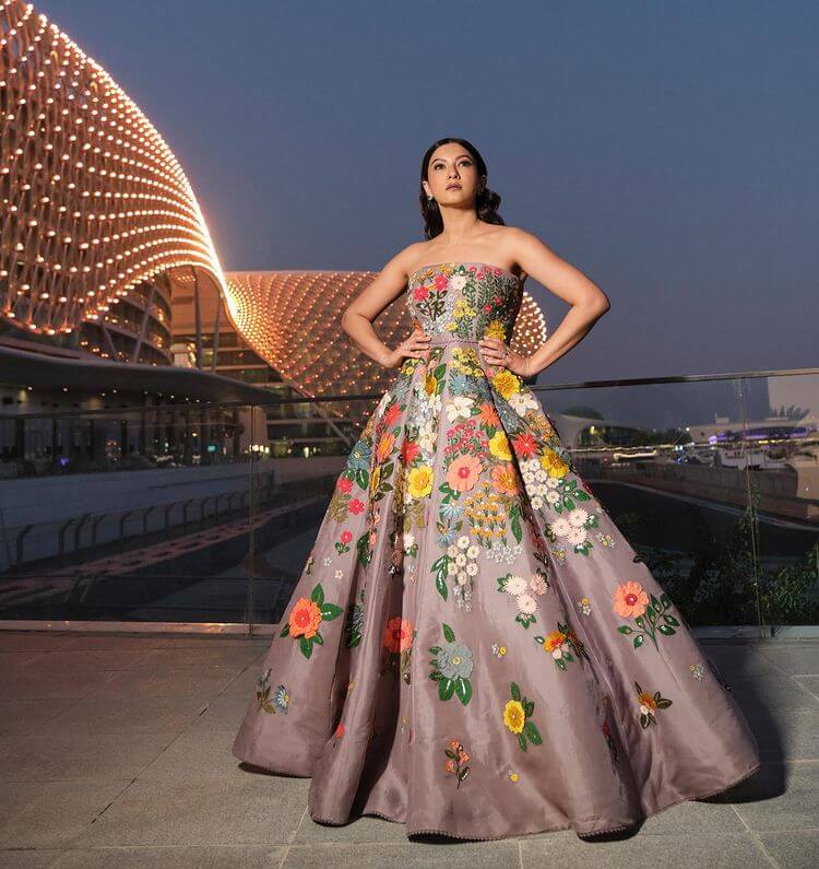 On the red carpet at IIFA in a pink floral gown from designer label Sahil Kochhar