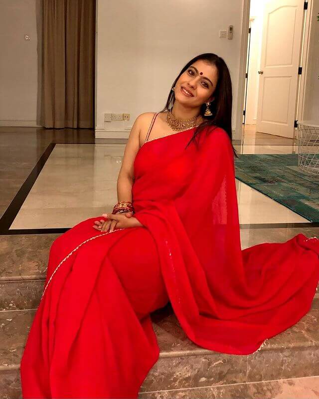Kajol Devgan's Wardrobe Of Designer Dresses, Sarees, And Outfits Six Filmfare Award-Winning, Bollywood Actor, Glamours Look In Red Saree