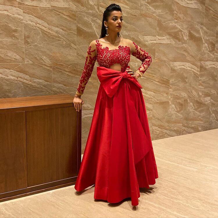 Stunning Look In A Red Gown Which Has A Big Bow