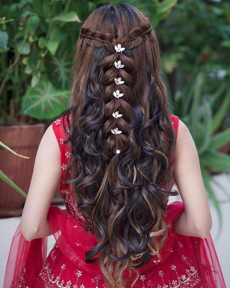 quirky-braided-hairstyle-for-engagement-in-lehenga- | WedAbout
