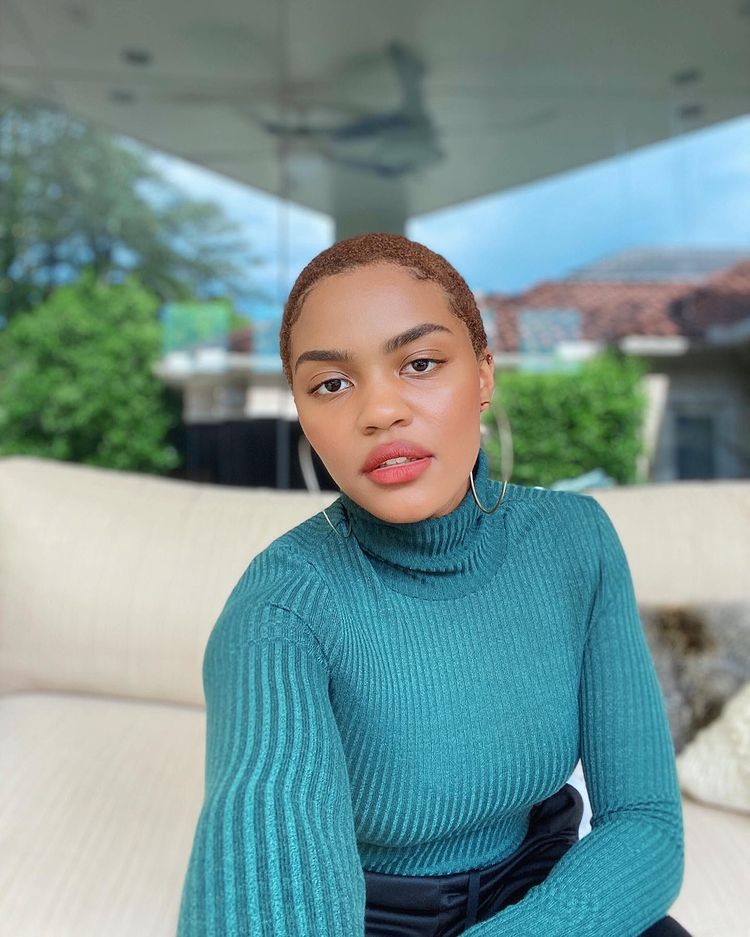 China Anne McClain In Green Colored Turtle Neck Top And Blue Jeans