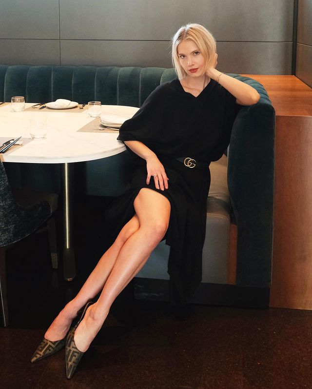 Claudia Flaunts Her Sexy Legs In A Black Dress
