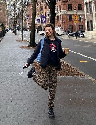  Genevieve Hannelius In Black Top And Animal Printed Pants Topped With Black Winter Jacket