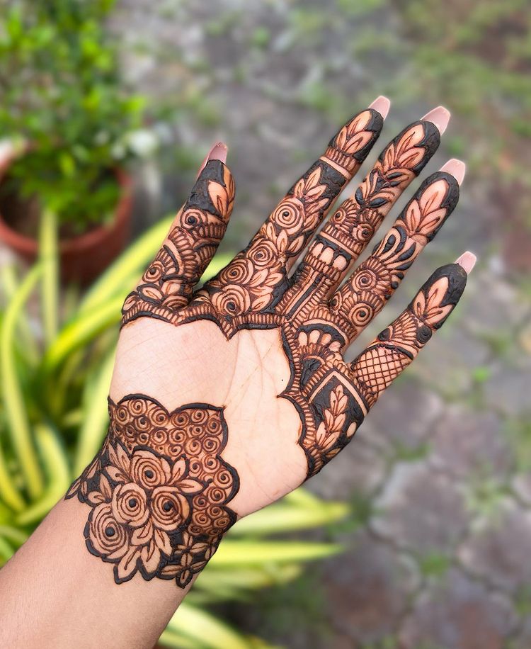 Mehndi ceremony hands. Elegant woman hand with Indian patterns henna t By  WinWin_artlab | TheHungryJPEG