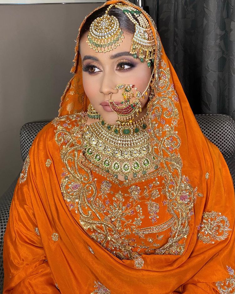  Multi-Colored And Heavy Work Design Nath For Bride
