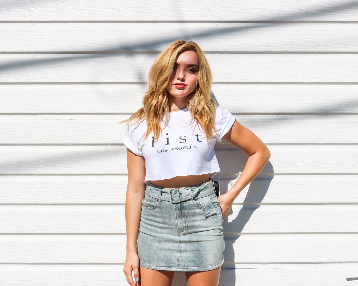 Peyton Looks Cute In A Denim Skirt And White Crop Top