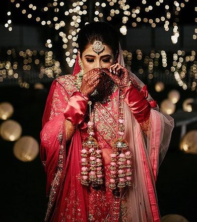 Pink Floral Or Golden Jhumka For The Bride To Wedding