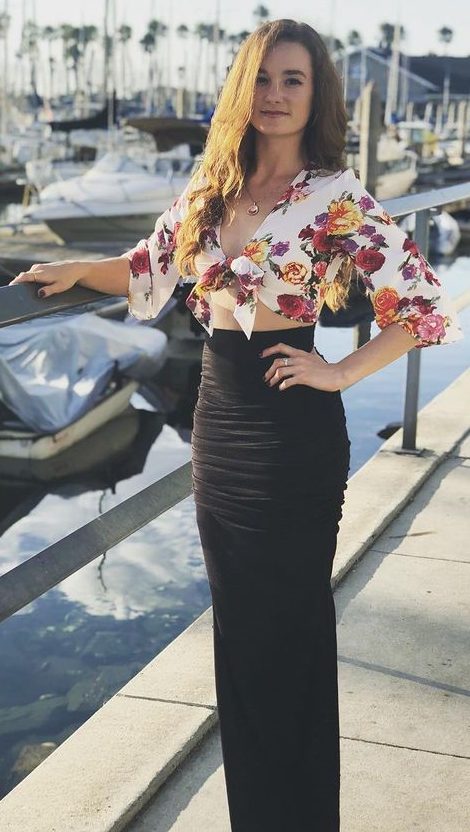 Pretty As Flower, Ellie Darcey In Floral Printed White Co-Ord Top And Black Long Skirt