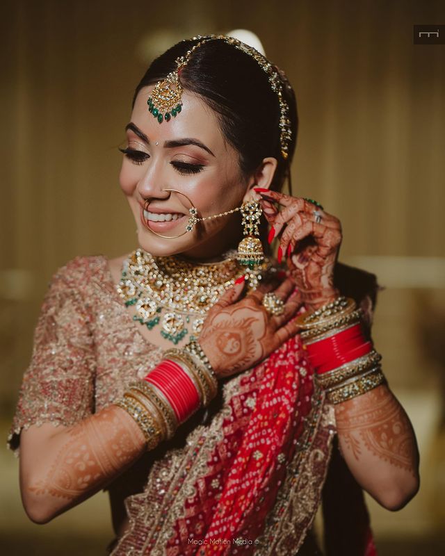 Red Chura With Shiny Bangles For A Wedding Look