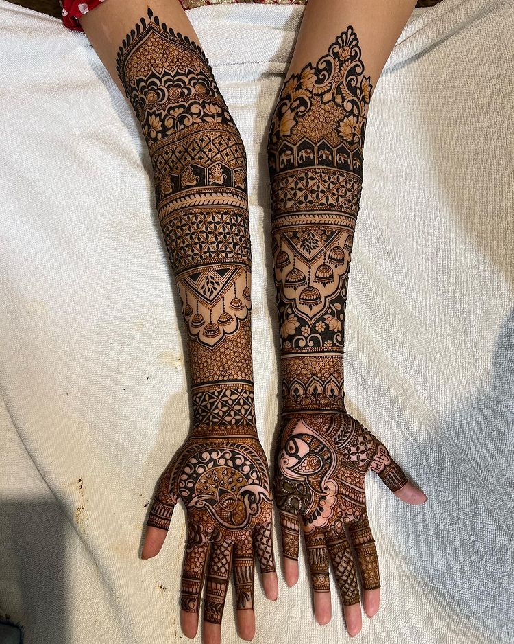 Rich And Intricate Mehndi Design With Peacocks