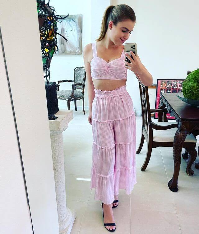 Sami Looks At Ease In Her Pink Crop Top And Cozy High-Waisted Bottoms At Home