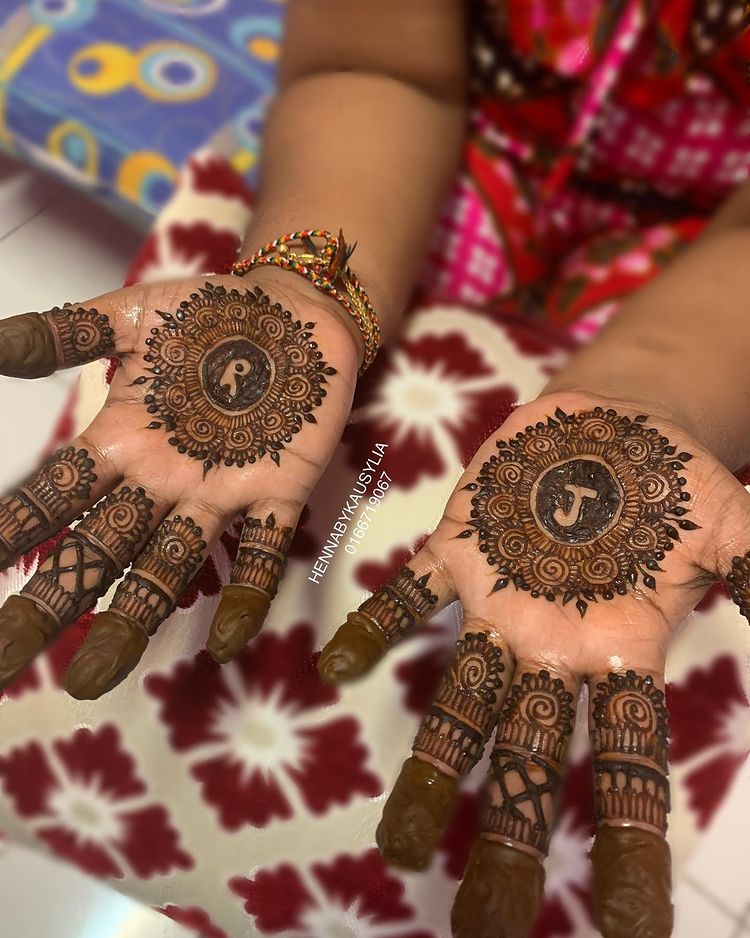 Simple Personalized Mandala Mehndi With Couple's Initials Etched On It.