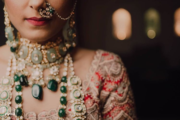 Small Designer Nath With White And Green Crystal Work Jewelry