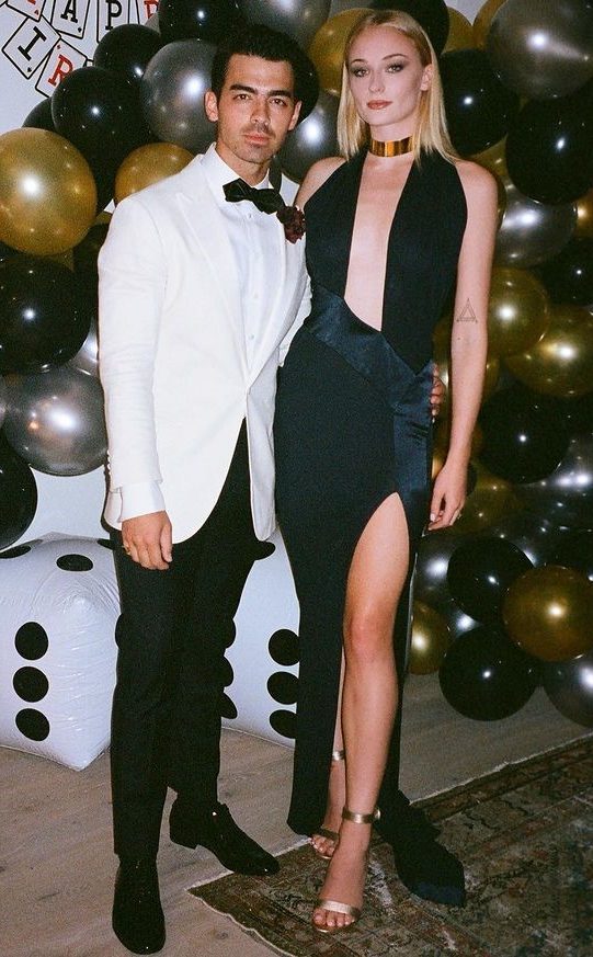 Sophie Stuns In A Low-Cut Navy Gown With A Thigh-High Slit