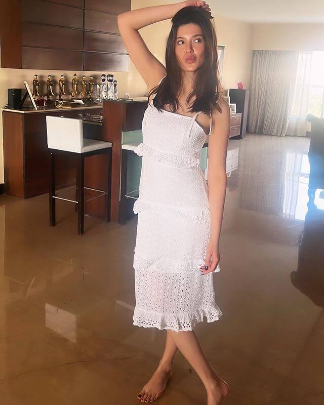 Cute And Casual Look Of Shanaya Kapoor In White Ankle Strappy Dress