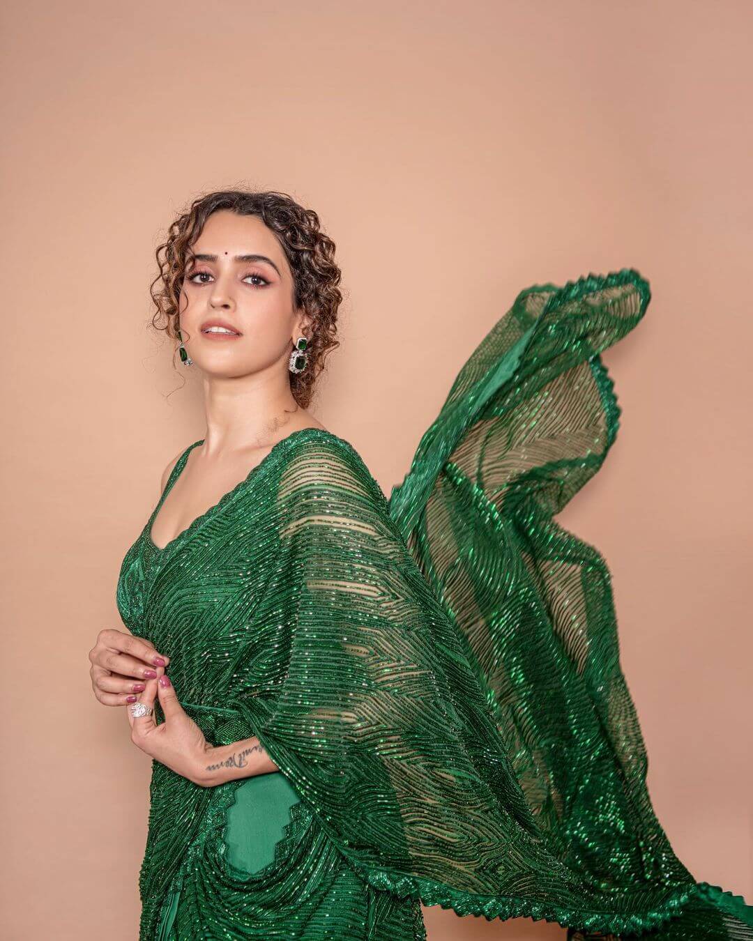 Defining The Word Elegance In A Stunning Green Saree