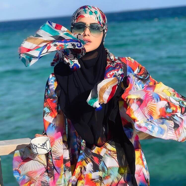 Sana Khan's Traditional Abayas Are Fashion Goals Wearing Multicolor Printed Abaya With A Black Scarf