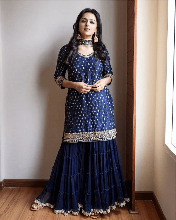Shraddha Beautiful Look In A Blue Ethnic Dress With Golden Jewelry