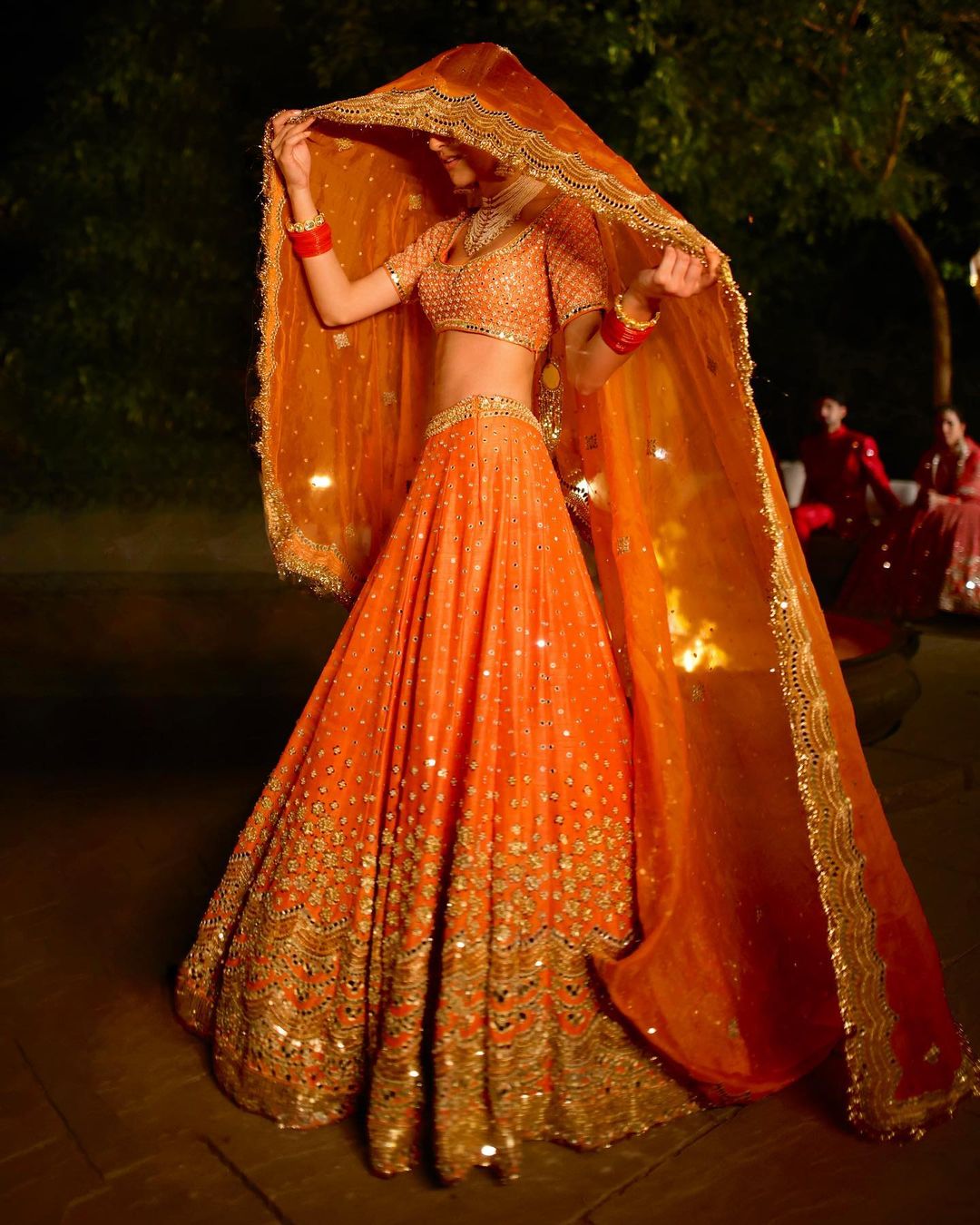 A Beautiful Bride Is Glistening In The Art Of Mirror Work