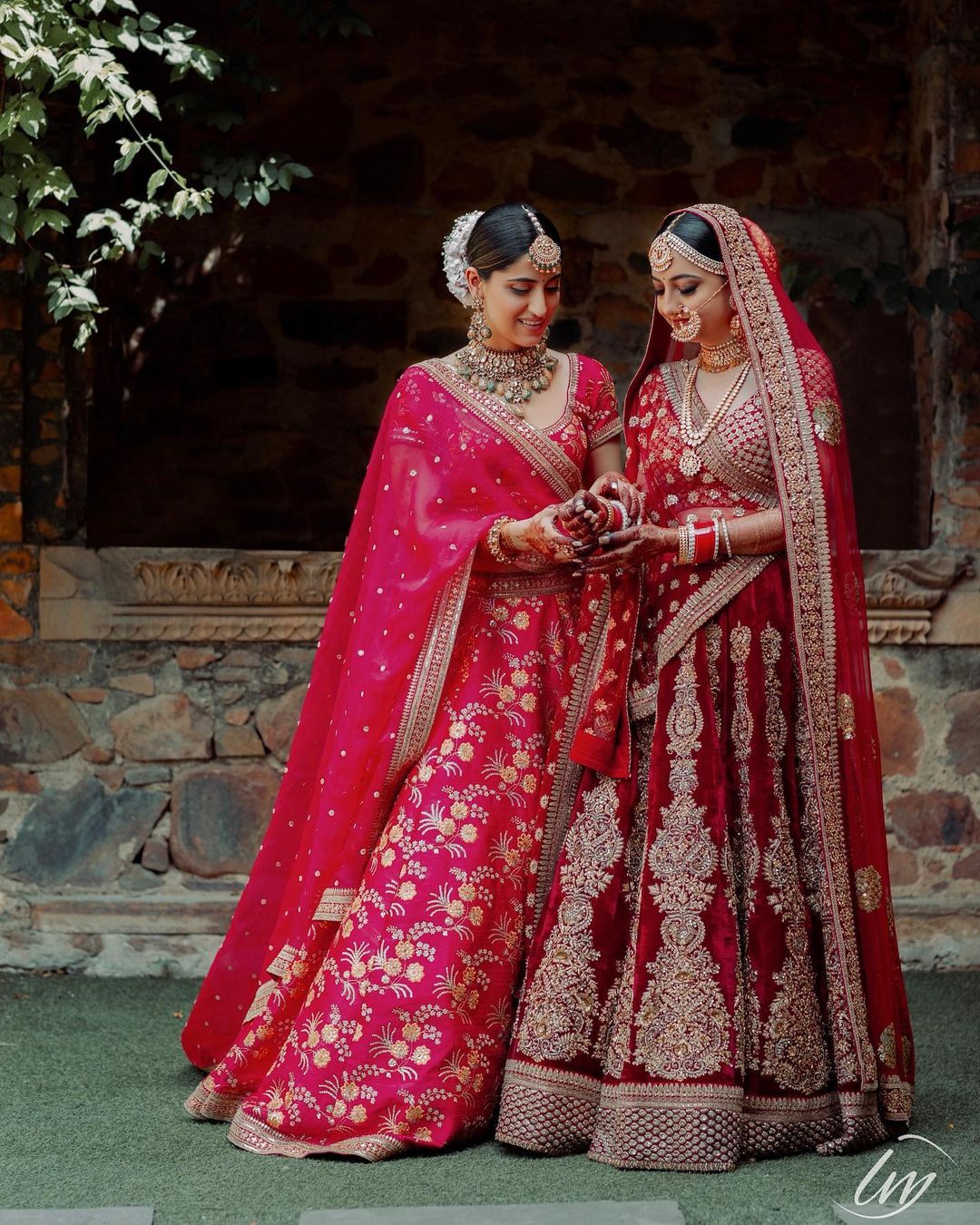 Bride's Sister poses on wedding Adjusting Your Wedding Bangles