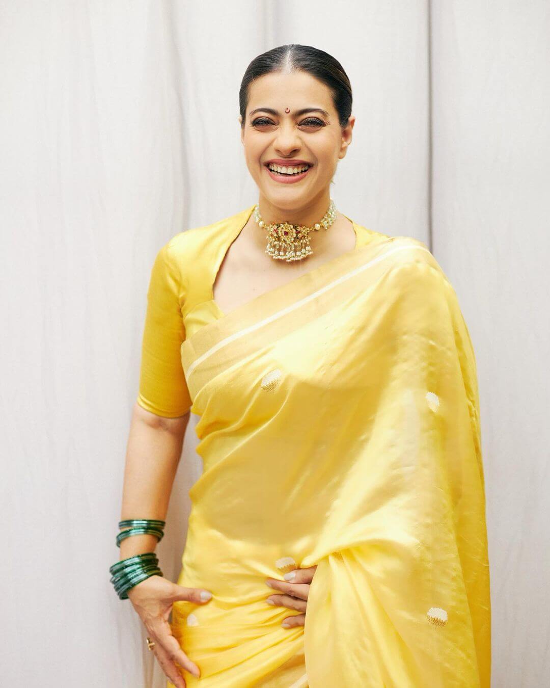 Kajol Devgan's Glossy Look In Yellow  Saree