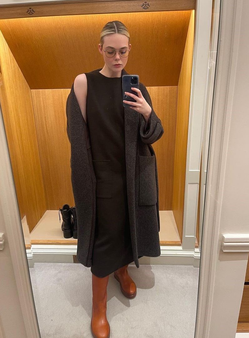 Elle Fanning's Winter Look In Sleeveless One-piece Dress Topped With Grey Blazer