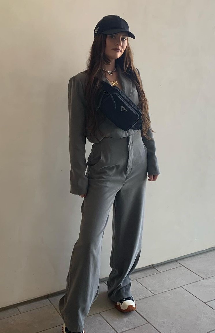 Hot Standing Pose In A Grey Power Suit
