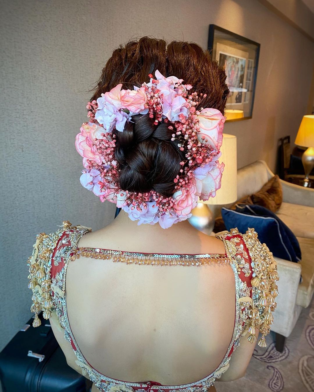 Orange And Pink, Floral Bun Hairstyle For Bride