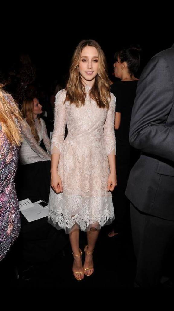 Taissa Looks Elegant In A White Lace Midi Dress