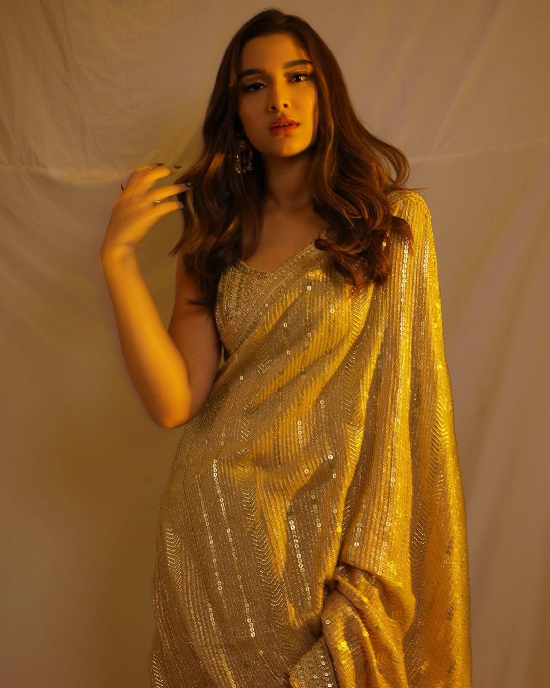 The Golden Saree Diva