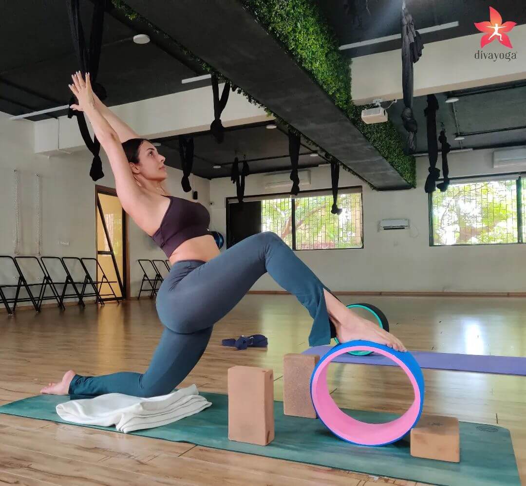 Top Indian Female Celebrity Inspired Outfits- Fitness Freak Malaika Arora In Bralette Top Paired With Gym Legging