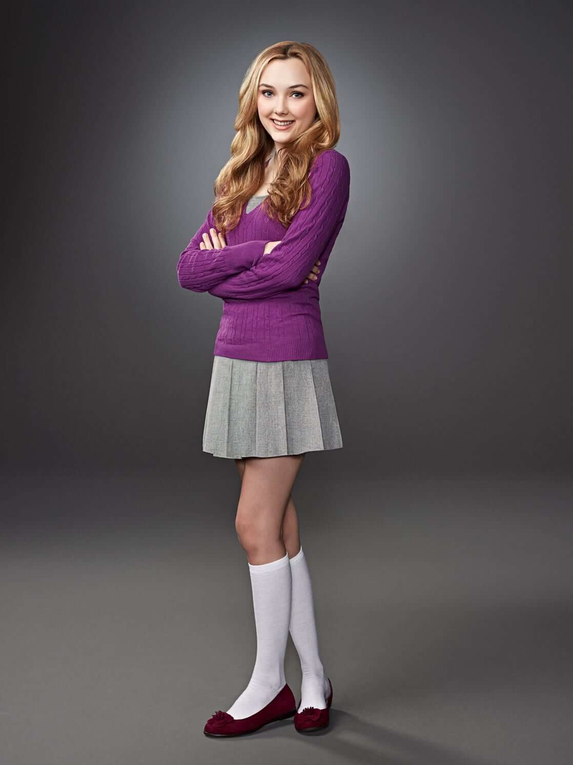 Victory Van In Awesome Purple Tee Paired WIth Pleated Grey Skirt