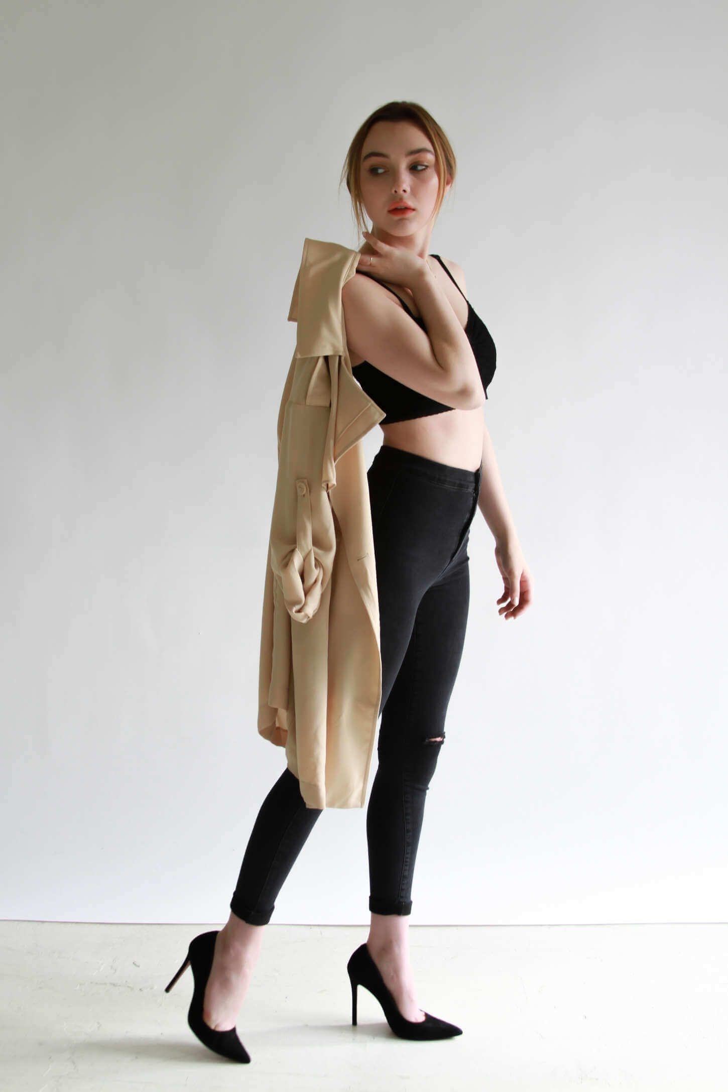 Victory's Sassy And Cool Look In Black Bralette Top Paired With Black Jeans And Creamy Jacket