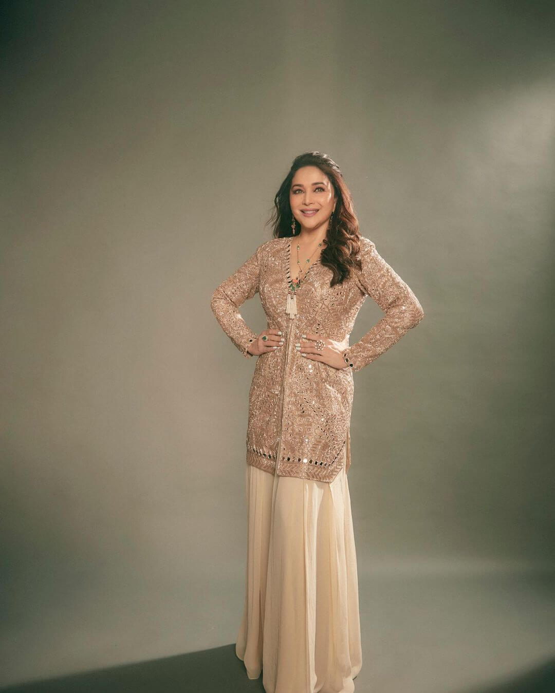 Ways To Look Trendy With Bollywood Celebrities bollywood diva madhuri in glamorous shimmering traditional dress