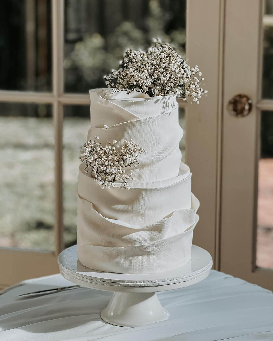 White On White elegant wedding cake