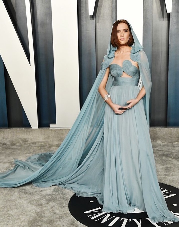 Zoey Looks Angelic In The Blue Cut-Out Gown With A Cape
