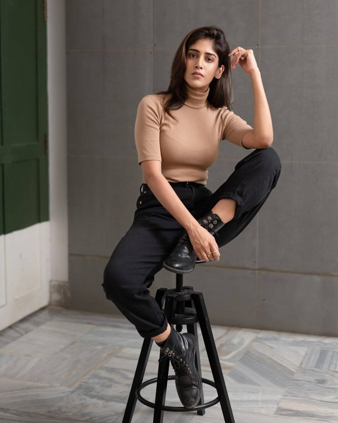 Chandini Chowdary Look Classy In Turtle Neck Top, Denims, And High Boots Outfit